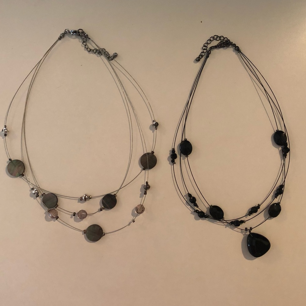 Two lightweight, multi-strand layered necklaces
